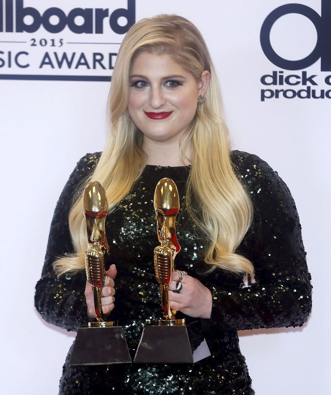 Meghan Trainor poses backstage with her awards during the 2015 Billboard Music Awards in Las Vegas