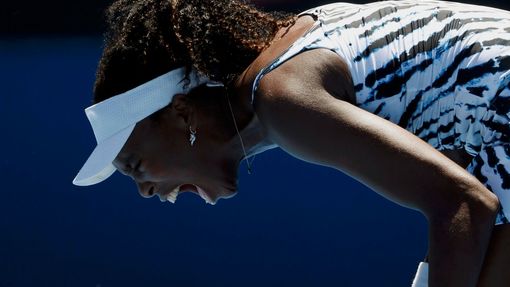 Venus Williams of the U.S. reacts during her women's singles match against Ekaterina Makarova of Russia at the Australian Open 2014 tennis tournament in Melbourne January