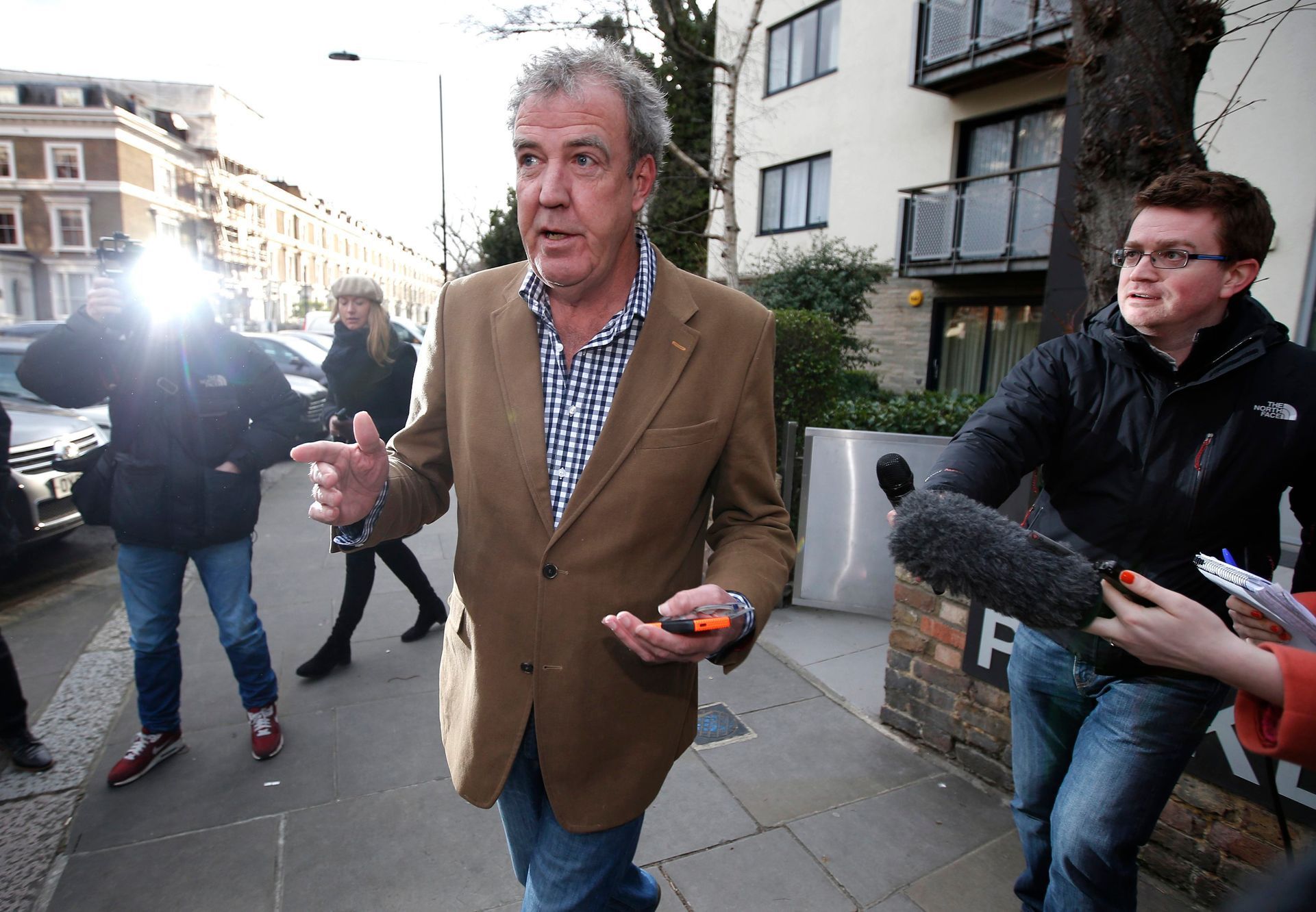 British television presenter Jeremy Clarkson leaves his home in London