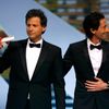 Director Bennett Miller, Best Director award winner for his film &quot;Foxcatcher&quot;, poses on stage with actor Adrien Brody after being awarded during the closing ceremony of the 67th Cannes Film