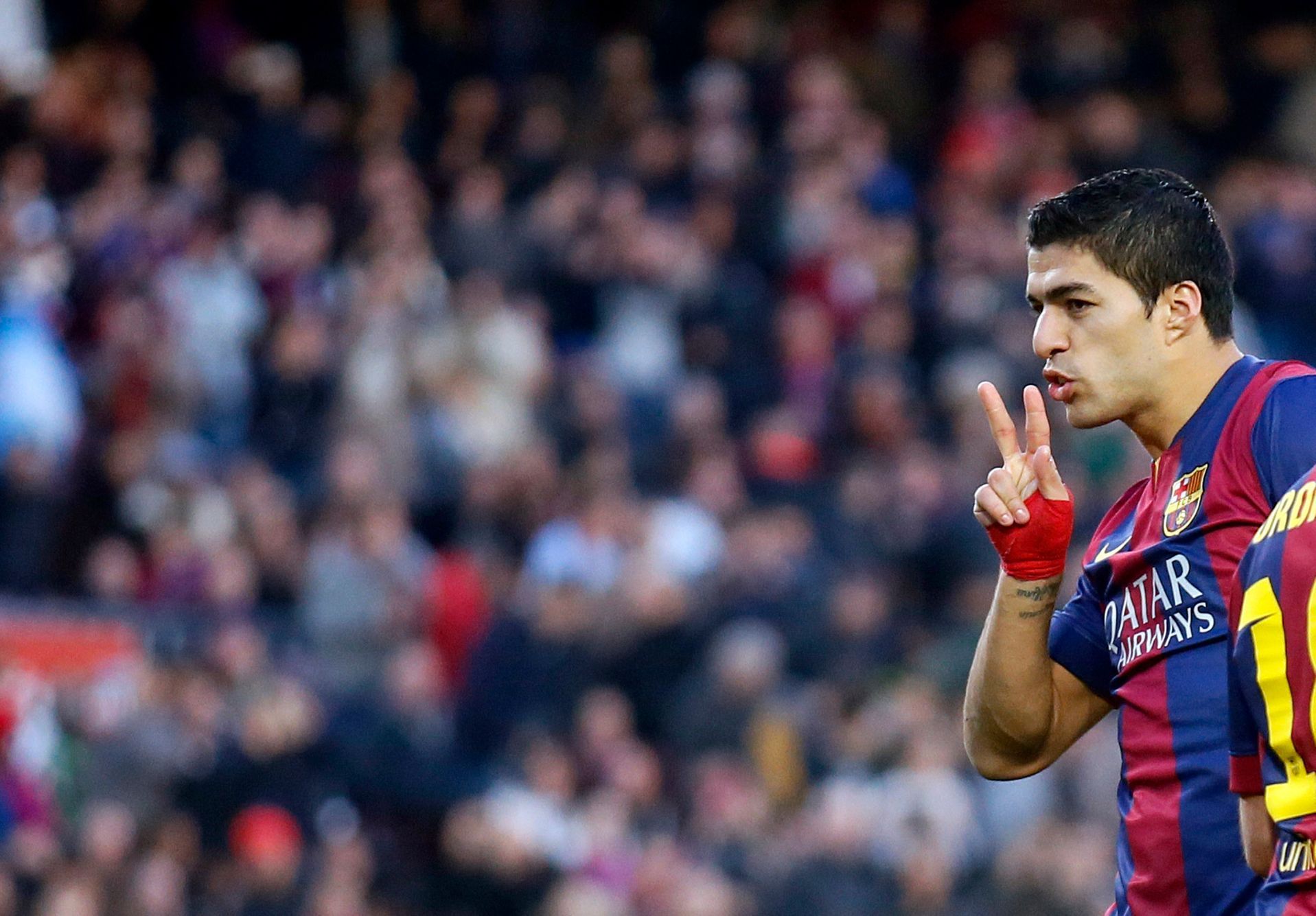 Barcelona's player Luis Suarez celebrates a goal against Cordoba during their Spanish First division soccer match in Barcelona