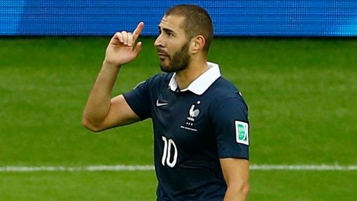 France's Benzema gestures after scoring a goal against Honduras during their 2014 World Cup Group E soccer match at the Beira Rio stadium in Porto Alegre