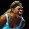 Serena Williams of the U.S. shouts as she wins a point against Caroline Wozniacki of Denmark during their WTA Finals singles semi-finals tennis match at the Singapore Indoor Stadium