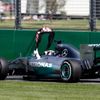 Mercedes Formula One driver Hamilton of Britain gets of his car after it broke down during the first practice session of the Australian F1 Grand Prix in Melbourne
