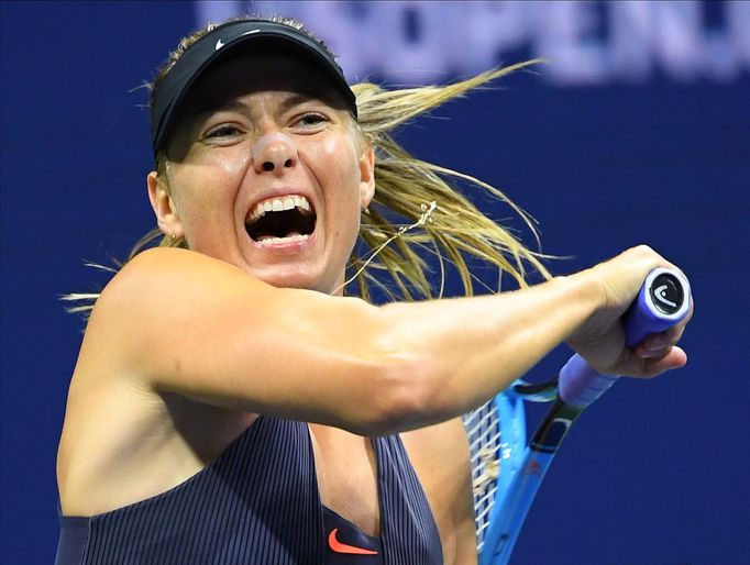 FILE PHOTO: Aug 26, 2019; Flushing, NY, USA;   Maria Sharapova of Russia hits to Serena Williams of the USA in the first round on day one of the 2019 U.S. Open tennis tou