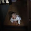 Lee Sae-byeok, 3, who was abandoned at a "baby box" at Joosarang church, is seen at the church in Seoul September 20, 2012.Pastor Lee Jong-rak, who runs the "baby box" where mothers can leave unwanted infants, has seen a sharp increase in the number of newborns being left there because, the pastor says, of a new law aimed protecting the rights of children. South Korea is trying to shed a reputation of being a source of babies for adoption by people abroad. It is encouraging domestic adoption and tightening up the process of a child's transfer from birth mother to adoptive parents. Picture taken September 20, 2012. REUTERS/Kim Hong-Ji (SOUTH KOREA - Tags: SOCIETY) Published: Říj. 7, 2012, 6:57 dop.