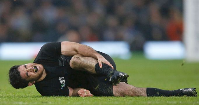 Nehe Milner-Skudder of New Zealand reacts after sustaining an injury during their Rugby World Cup semi-final match against South Africa at Twickenham in London, Britain O