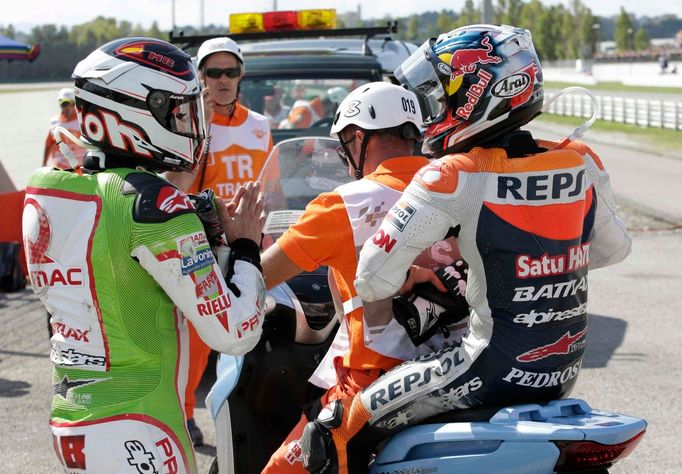 Španělští motocyklisté Dani Pedrosa a Héctor Barbera havarovali v MotoGP během Velké ceny San Marina 2012.