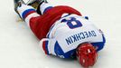 Russia's Alexander Ovechkin lays on the ice during the third period of their men's ice hockey World Championship Group B game against Germany at Minsk Arena in Minsk May