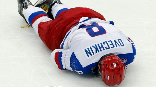 Russia's Alexander Ovechkin lays on the ice during the third period of their men's ice hockey World Championship Group B game against Germany at Minsk Arena in Minsk May