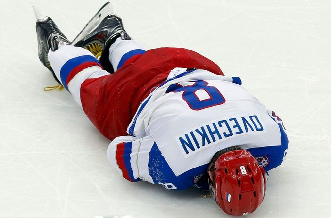 Russia's Alexander Ovechkin lays on the ice during the third period of their men's ice hockey World Championship Group B game against Germany at Minsk Arena in Minsk May