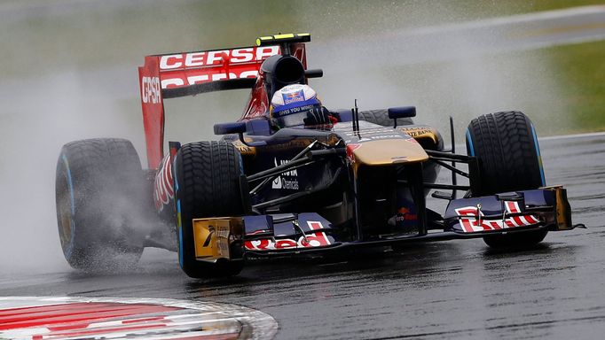 Toro Rosso Formula One driver Daniel Ricciardo of Australia takes a corner during the first practice session for the British Grand Prix at the Silverstone Race circuit, c