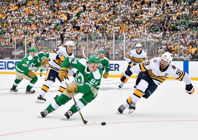 Jan 1, 2020; Dallas, TX, USA; Dallas Stars left wing Roope Hintz (24) is chased by Nashville Predators defenseman Roman Josi (59) during the third period in the 2020 Wint