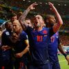 Robben of the Netherlands is congratulated by his teammates after he scored a goal against Spain during their 2014 World Cup Group B soccer match at the Fonte Nova arena in Salvador