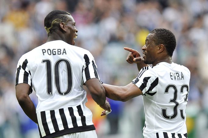 Paul Pogba a Patrice Evra