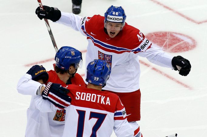 Vladimir Sobotka of the Czech Republic (C) celebrates his goal against Norway with team mates Tomas Hertl (top) and Ondrej Nemec (L) during the first period of their men'