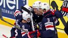 Brock Nelson of the U.S. (2nd R) celebrates his goal against Finland with team mates during the first period of their men's ice hockey World Championship Group B game at