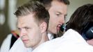 McLaren Formula One driver Kevin Magnussen of Denmark looks on in the team garage during the third practice session of the Australian F1 Grand Prix at the Albert Park cir