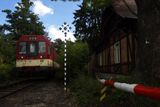 V podhůří Jizerských hor vedou koleje malebnou krajinou a na trati operují kromě klasických červených motorových střel...