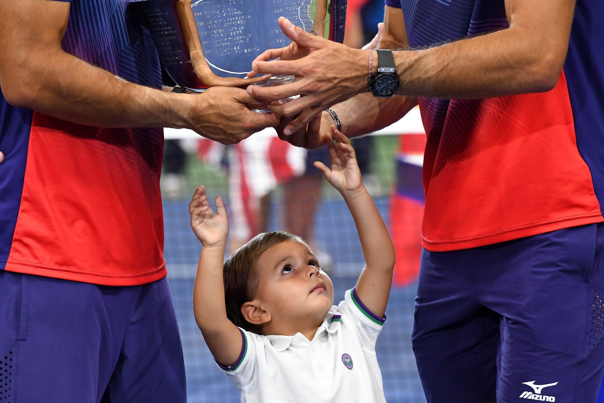 Juan Sebastian Cabal, jeho syn Jacobo a Robert Farah na US Open