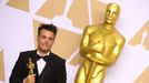 Director Sebastian Lelio from Chile holds the Oscar for Best Foreign Language Film