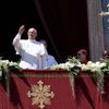 Pope Francis waves as he arrives to deliver the Urbi et Orbi (to the city and the world) benediction at the end of the Easter Mass in Saint Peter's Square at the Vatican