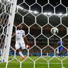 England's Daniel Sturridge scores past Italy's Salvatore Sirigu during World Cup soccer match in Manaus