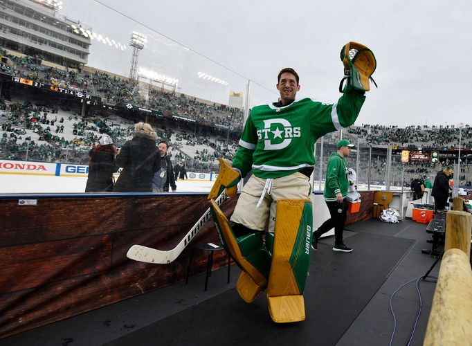 Jan 1, 2020; Dallas, TX, USA; Dallas Stars goaltender Ben Bishop (30) celebrates as he walks off the ice after defeating the Nashville Predators in the 2020 Winter Classi