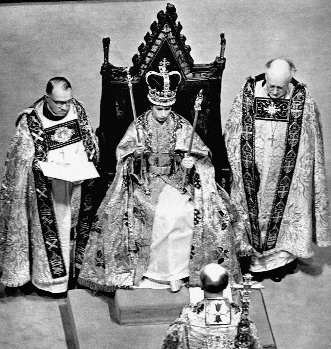 The Queen of England is flanked by the Bishop of Durham Rev. Arthur Michael Ramsay, left, and the Bishop of Bath and Wells High Rev. Harold William Bradfield.