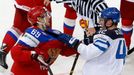 Russia's Alexander Burmistrov (L) fights with Finland's Jere Sallinen (R) during the second period of their men's ice hockey World Championship group B game at Minsk Aren