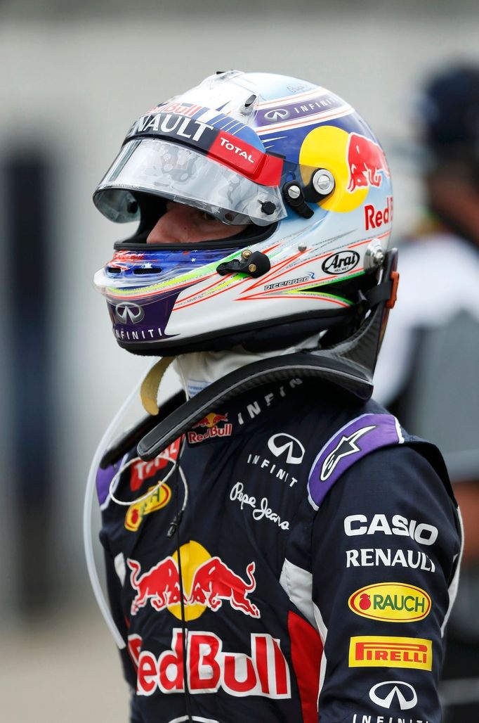 Red Bull Formula One driver Daniel Ricciardo of Australia walks after the qualifying session of the Australian F1 Grand Prix at the Albert Park circuit in Melbourne March