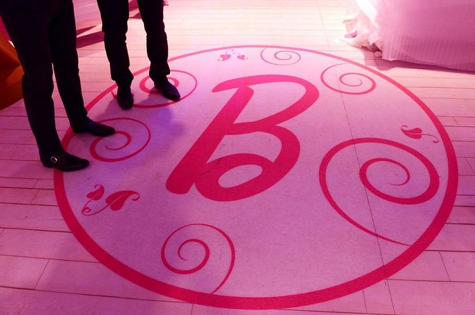 This picture taken on April 12, 2013 shows visitors during a press presentation of the 'Barbie Dreamhouse, in Berlin. The opening this month of the first life-sized Barbie Dreamhouse in Europe may be many little girls' fantasy, but Berlin feminists are mobilising against what they call a sexist icon.