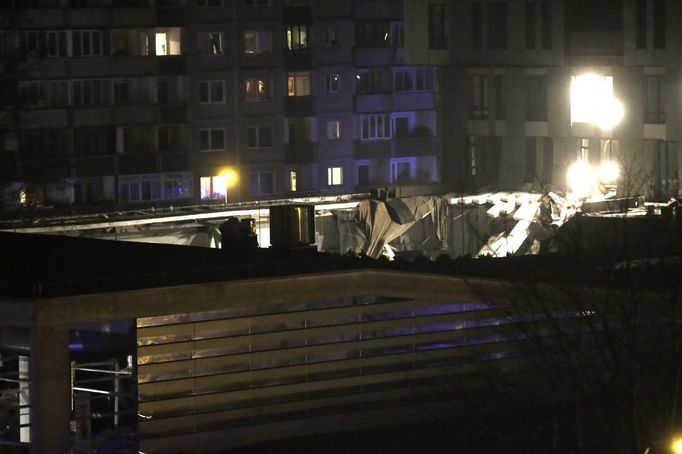 The collapsed roof of a store is pictured in Riga November 21, 2013. Two people were killed and more are feared trapped after the roof collapsed on Thursday evening, a rescue official said. Latvian rescue service spokeswoman Inga Vetere said at least 20 more people were injured. The cause of the collapse was not known. REUTERS/Ints Kalnins (LATVIA - Tags: DISASTER)