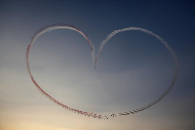 Military aircraft fly over Tahrir Square and participate in flying display as Egypt celebrates the anniversary of an attack on Israeli forces during the 1973 war, in Cairo