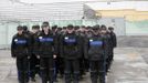 Inmates stand in formation before walking inside a high-security male prison camp outside Russia's Siberian city of Krasnoyarsk May 14, 2013. High-security male prison camp number 17 is intended to house male inmates who are serving a sentence for the first time, and have been convicted for serious crimes. Prisoners at the facility work in wood and metal processing shops, manufacture furniture, sew clothes and do other kinds of work. They can also take part in educational, sport and cultural programs. Picture taken May 14, 2013. REUTERS/Ilya Naymushin (RUSSIA - Tags: CRIME LAW SOCIETY) ATTENTION EDITORS: PICTURE 5 OF 29 FOR PACKAGE 'INSIDE SIBERIA'S PRISONS' SEARCH 'ILYA PRISON' FOR ALL IMAGES Published: Čer. 19, 2013, 10:02 dop.