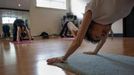 Yoga instructor Tao Porchon-Lynch leads a class in Hartsdale, New York, May 14, 2012.