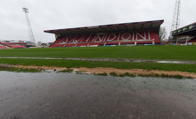 Soccer Football - League Two - Swindon Town v Scunthorpe United - The County Ground, Swindon, Britain - February 15, 2020   General view of rain pooling pitchside after t