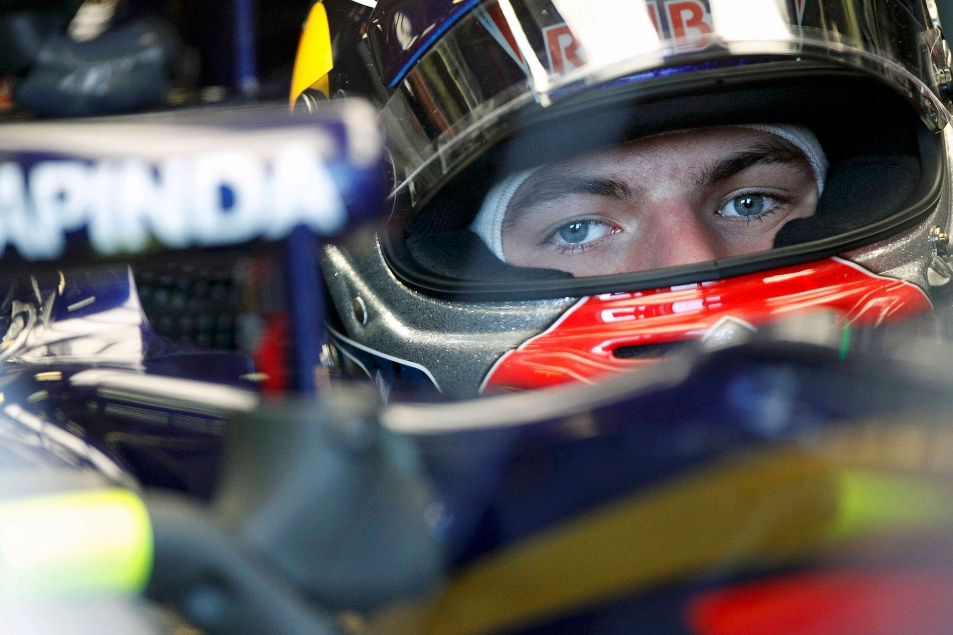 Toro Rosso Formula One driver Max Verstappen of the Netherlands sits in his car during the second practice session of the Australian F1 Grand Prix at the Albert Park circuit in Melbourne