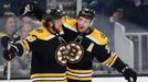 Oct 17, 2019; Boston, MA, USA; Boston Bruins center Patrice Bergeron (37) celebrates with right wing David Pastrňák (88) after scoirng a goal during the second period aga