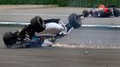 Williams Formula One driver Felipe Massa of Brazil crashes with his car in the first corner after the start of the German F1 Grand Prix at the Hockenheim racing circuit,