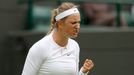 Victoria Azarenka of Belarus reacts during her women's singles tennis match against Maria Joao Koehler of Portugal at the Wimbledon Tennis Championships, in London June 2