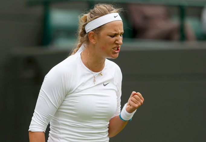 Victoria Azarenka of Belarus reacts during her women's singles tennis match against Maria Joao Koehler of Portugal at the Wimbledon Tennis Championships, in London June 2