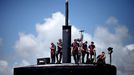 April 24, 2011 - Cape Canaveral, Florida, U.S. - -- Cape Canaveral, Fla. -- Commander John Gearhart, center, on the bridge with submariners aboard the USS Annapolis (SSN 760), a S6G nuclear reactor powered fast attack submarine, moored at Port Canaveral in Cape Canaveral on Sunday. The USS Annapolis measures 362 ft. in length and 33 ft. at the beam, a diving depth of over 400 ft., 27+ mph, 12 vertical launch missile tubes, 4 torpedo tubes, and a crew of 130 submariners. The submarine was commissioned April 11, 1992 with its homeport in Groton, Connecticut. (Credit Image: © Gary Coronado/The Palm Beach Post)