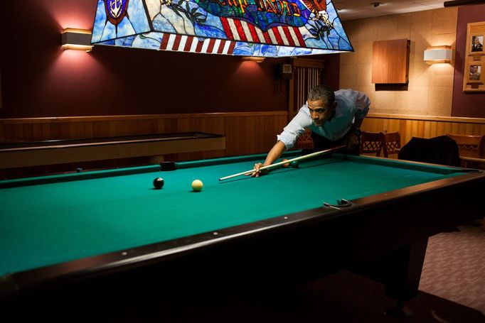 May 19, 2012 "Following the conclusion of the G8 Summit, the President plays a game of pool in the Holly Cabin at Camp David."