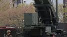 A Japan Self-Defence Forces soldier stands guard near Patriot Advanced Capability-3 (PAC-3) missiles at the Defence Ministry in Tokyo April 9, 2013. Japanese public broadcaster NHK showed aerial footage of what it said were ballistic missile interceptors being deployed near Tokyo in response to North Korea's threats and actions. Japan in the past has deployed ground-based PAC-3 interceptors, as well as Aegis radar-equipped destroyers carrying Standard Missile-3 (SM-3) interceptors in the run-up to North Korean missile launches. REUTERS/Issei Kato (JAPAN - Tags: POLITICS MILITARY) Published: Dub. 9, 2013, 2:13 dop.