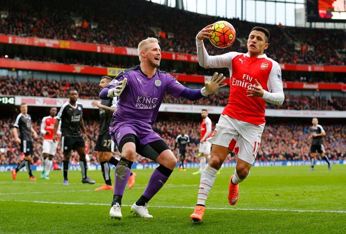 Leicester's Kasper Schmeichel with Arsenal's Alexis Sanchez