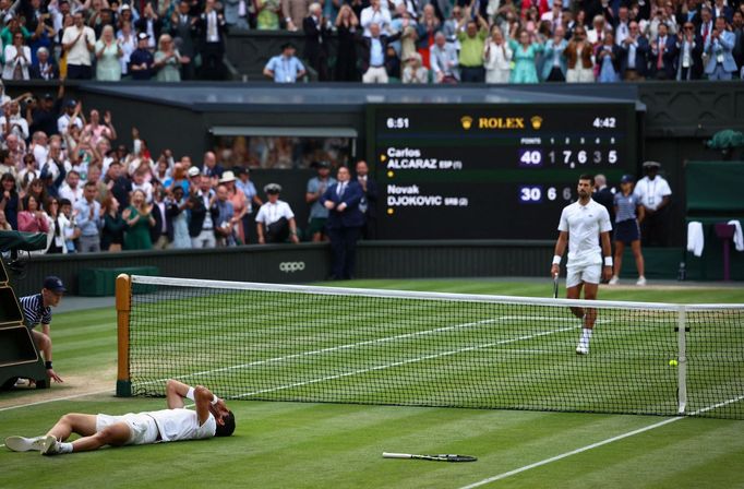 Tennis - Wimbledon - All England Lawn Tennis and Croquet Club, London, Britain - July 16, 2023 Spain's Carlos Alcaraz celebrates after winning his final match against Ser