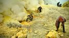 Miners working at the Ijen crater Sulfur miners in Eastern Java's famous sulfur-belching Ijen crater rely on their sheer muscle power to mine sulfur in some of the most d