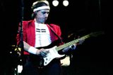Při koncertu s Dire Straits roku 1983 na stadionu v Záhřebu.