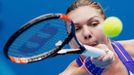 Simona Halep of Romania hits a return to Ekaterina Makarova of Russia during their women's singles quarter-final match at the Australian Open 2015 tennis tournament in Me